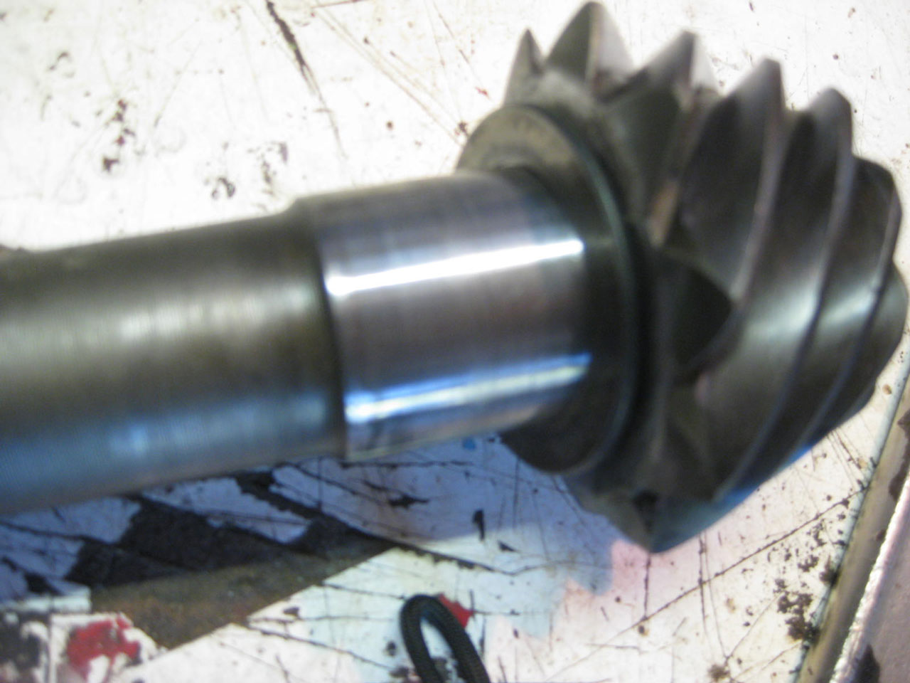 Linished pinion with machined spacer ready for bearing